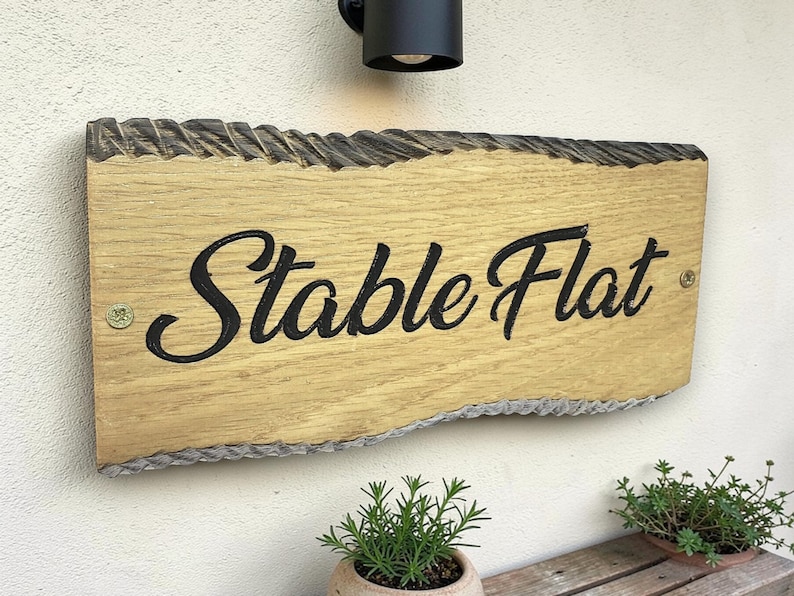 Personalised oak wooden house sign with garden background UK handmade exterior plaque