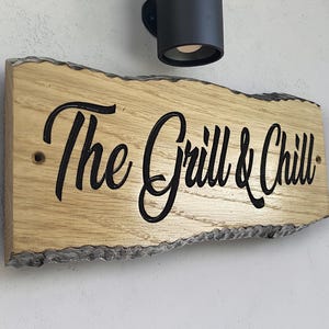 Custom engraved oak house sign with script font exterior wooden address plaque UK