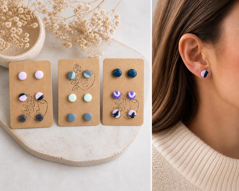 K&ouml;nnte beinhalten: Drei Sets von Ohrsteckern auf braunen Karten. Jede Karte zeigt zwei Paar Ohrringe in verschiedenen Farben und Mustern, darunter marmorierte und unifarbene Designs. Ein Ohrring wird am Ohr einer Person gezeigt, mit einem schwarz-wei&szlig;en Marmormuster.