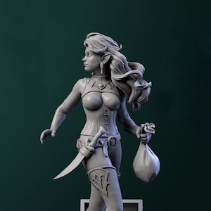 May include: A gray 3D printed figurine of a female elf character. She is wearing a corset, pants, and boots. She is holding a dagger and a bag of coins. The figurine is standing on a circular base with a stone texture.