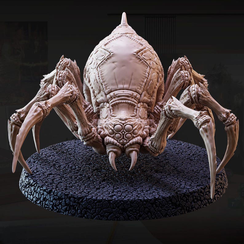 May include: A detailed, beige-colored spider-like creature with multiple legs and a segmented body. The creature has a textured surface and is posed on a dark, circular base. The design features intricate details, suggesting a fantasy or sci-fi theme.