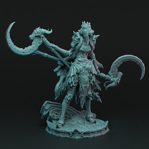 May include: A detailed, gray, resin figurine of a female warrior with a crown, holding two curved, bladed weapons. The figure stands on a circular base with intricate details.