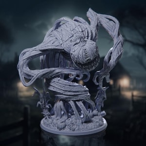 May include: A gray, unpainted resin miniature figure of a monstrous pumpkin creature with a wide, toothy grin and vine-like limbs. The figure stands on a circular base surrounded by smaller carved pumpkins and twisted, root-like structures.