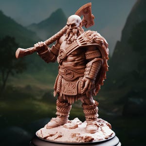 May include: A detailed brown figurine of a muscular Viking warrior with a bald head and long beard, holding a large axe over his shoulder. The figure is adorned with intricate armor and fur detailing, standing on a rocky base. The background features a blurred mountain landscape.