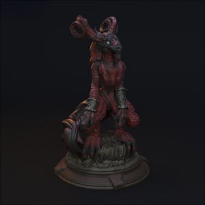 May include: A red and black fantasy figurine of a dragon-like creature with horns, detailed scales, and armored wrist cuffs. The figure is posed on a small, textured base with a dark background.