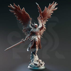 May include: A detailed, gray, sculpted figurine of an angel warrior with large wings, holding a sword and standing on a rocky base.