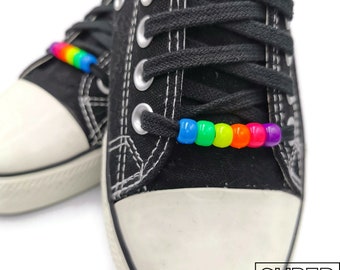 “Rainbow” shoe ornaments. Super Laces, Roller Derby, Dr Martens, Converse