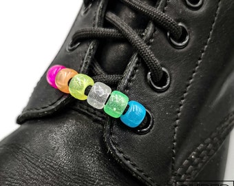 “Rainbow” glow in the dark shoe ornaments. Super Laces, Roller Derby, Dr Martens, Converse