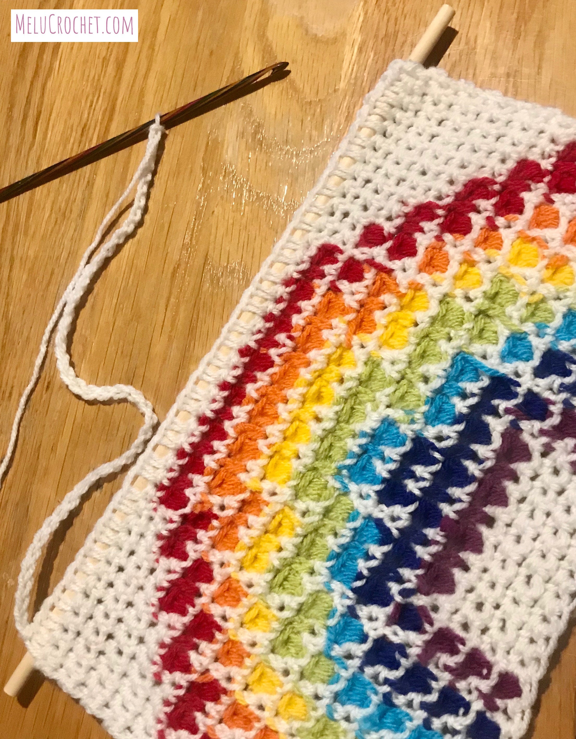 40 Rainbow Crochet Patterns to Brighten Home Decor, Gifts, and Everyday Accessories 40 Chase The Rainbow Bobble Stitch Wall Hanging by Melu