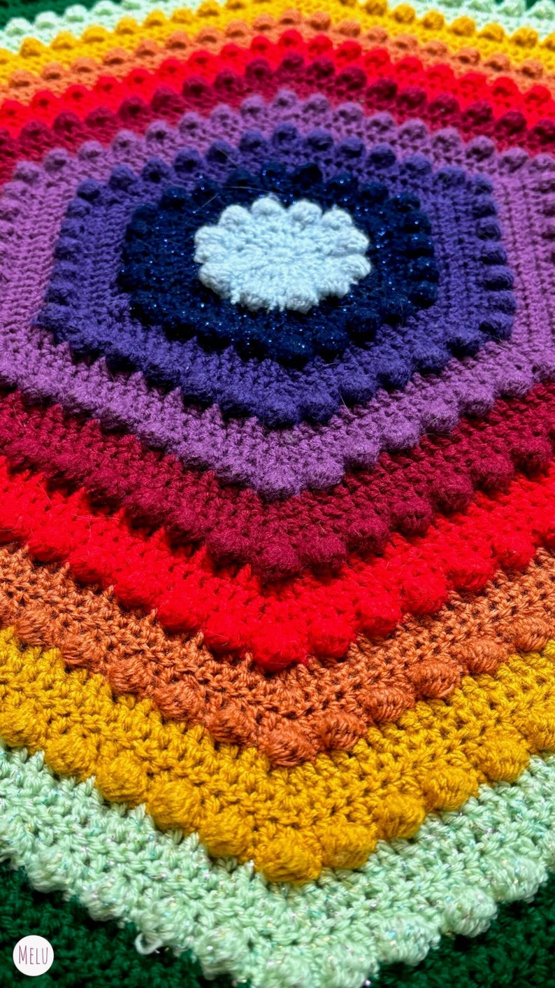 rainbow coloured bath mat made with crochet
