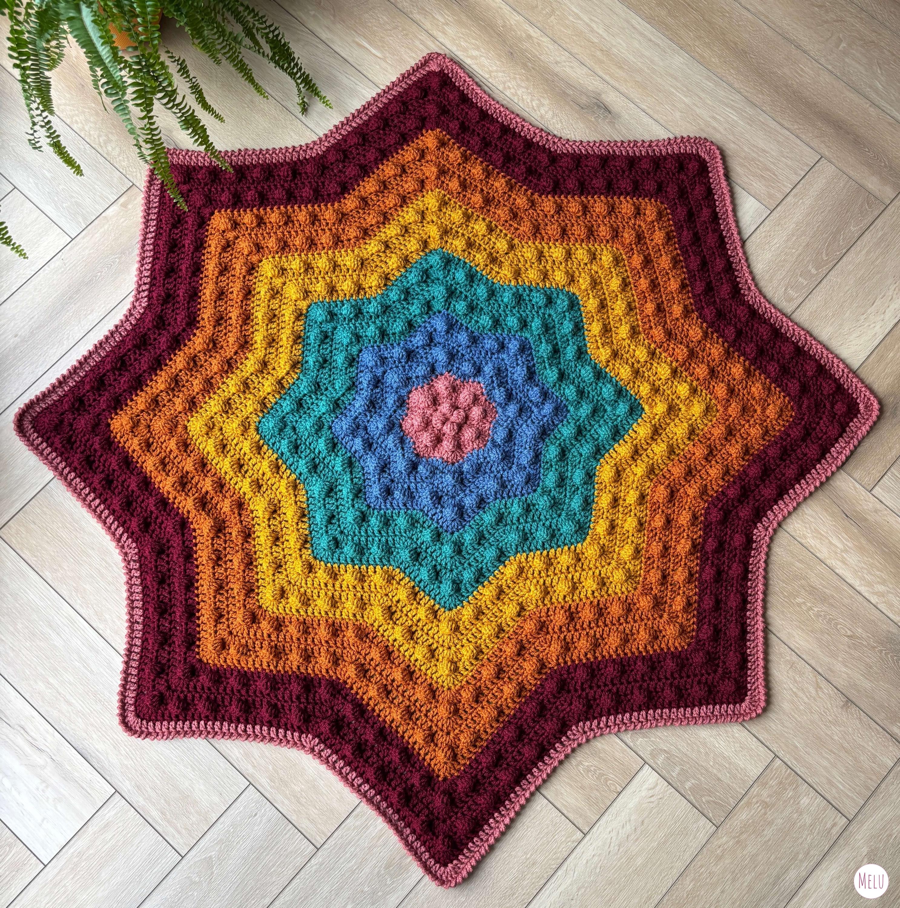 40 Rainbow Blanket Crochet Patterns to Brighten Baby Rooms, Throws, and Gift Giving 21 Nebula Bobble Star Dark Rainbow Blanket pattern by Melu