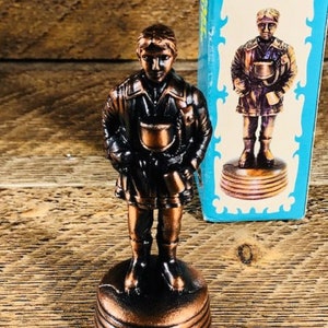 Vintage Die-Cast Miniature Fireman Pencil Sharpener - Collectible Dressed Firefighter Figurine