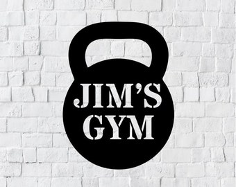 May include: Black and white image of a kettlebell with the text "JIM'S GYM" on it.