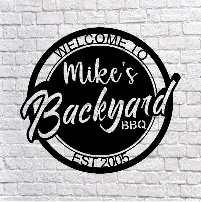 May include: Black metal sign with white text that reads "Welcome to Mike's Backyard BBQ Est 2005".