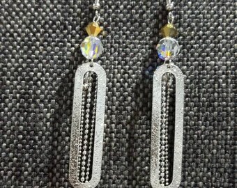 The trendy dangling sparkly earrings