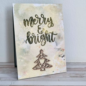 Carte de Noël faite à la main avec des éléments en bois – unique et festive