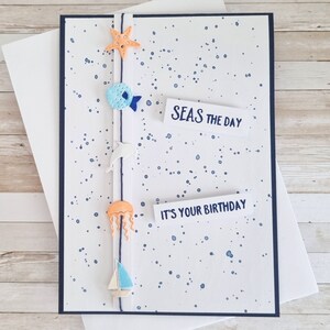 Biglietto d'auguri marittimo fatto e colorato a mano - Biglietto pieghevole A6 con stella marina, delfino + Co.