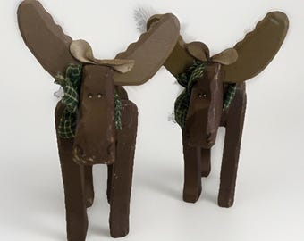 Hand carved hand painted wooden moose With Bow And Leather Ears