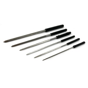 May include: Set of six metal needle files with black handles. The files are of varying lengths and have a fine, smooth finish.