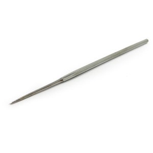 May include: A silver metal tool with a pointed tip and a long, thin handle.
