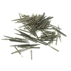 May include: A pile of silver-coloured watch repair pins, also known as watch hands, on a white background.