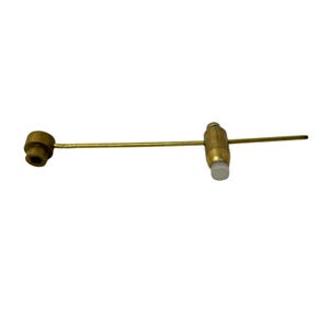 May include: A brass-coloured circle cutter tool with a long, thin arm and a small, cylindrical cutting head. The tool has a white, cylindrical piece on the cutting head and a small, circular piece on the opposite end.
