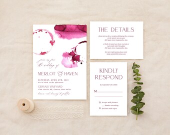 May include: Wedding invitation with a watercolor design of wine stains in shades of pink and red. The invitation is for the wedding of Merlot and Haven on Saturday, April 6th, 2025 at 4 o'clock in the afternoon at Gervasi Vineyard in Canton, Ohio. The RSVP card requests a response by September 20, 2025.