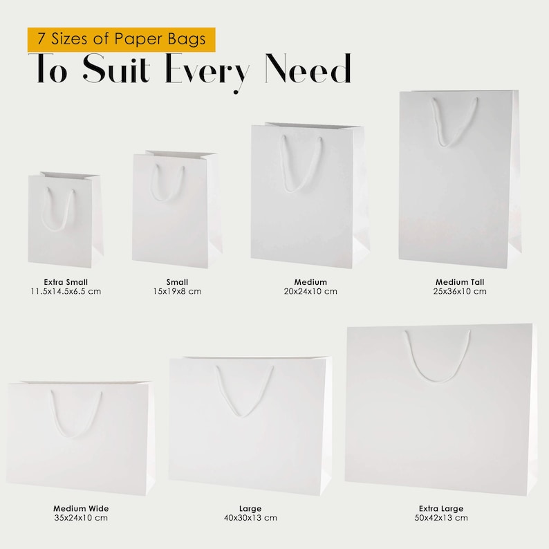May include: Seven white paper bags with rope handles in various sizes, labeled with dimensions in centimeters: 11.5x14.5x6.5, 15x19x8, 20x24x10, 25x36x10, 35x24x10, 40x30x13, and 50x42x13. The text reads 7 Sizes of Paper Bags To Suit Every Need.