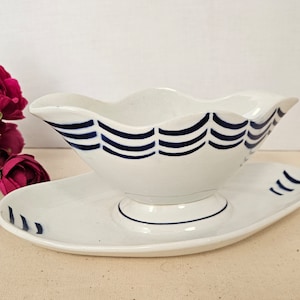 Old gravy boat &quot;Janvier&quot; model from the French manufacture of Saint Amand