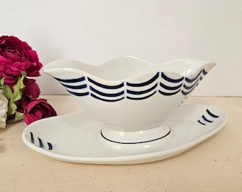 Old gravy boat &quot;Janvier&quot; model from the French manufacture of Saint Amand
