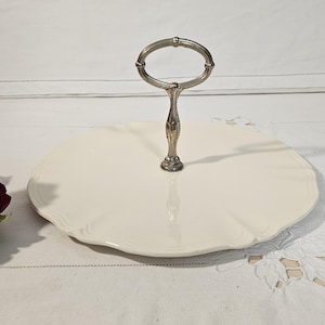 Old round flat serving dish, &quot;Rohan&quot; model, from the French manufacturer of Sarreguemines