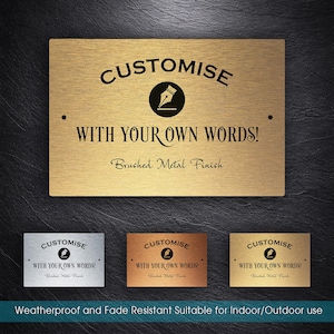 May include: A rectangular brushed metal sign with the text "CUSTOMISE WITH YOUR OWN WORDS!" in black. The sign has a pen nib icon and is suitable for indoor/outdoor use.