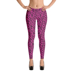 May include: Pink leggings with a black leopard print pattern.