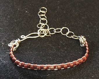 Wire Wrapped Adjustable Bracelet made with copper wire colored dark copper and silver