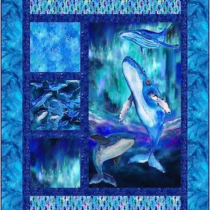 May include: A blue and white quilt featuring whales. The quilt has a central panel with a whale illustration, surrounded by blue panels with various patterns, including seahorses and abstract designs. The overall theme is marine life.