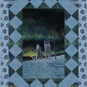 May include: A quilt featuring a central image of two wolves in a snowy landscape under a colorful sky. The quilt has a blue diamond and paw print border.
