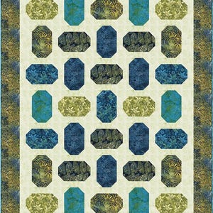 May include: A quilt pattern with a white background and a repeating pattern of blue and green octagons. The octagons have different patterns, including floral, leaf, and geometric designs.