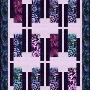 May include: A quilt block with a purple and blue floral pattern. The block is made up of nine squares, with the floral pattern in the center squares and black squares surrounding them.