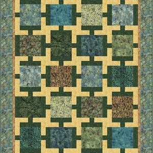 May include: A quilt with a geometric pattern of squares in shades of green, blue, and brown. The squares are arranged in a grid pattern, with each square surrounded by a thin border of a contrasting color.