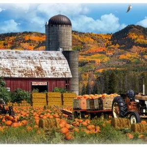 May include: A red barn with a weathered metal roof sits on a hill overlooking a field of pumpkins. A vintage tractor with a trailer full of pumpkins is parked in front of the barn. The background features a colorful autumn landscape with trees in shades of red, orange, and yellow.