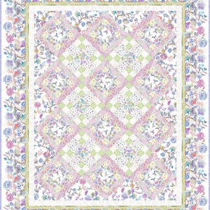 May include: A quilt with a white background and a patchwork design of pink, green, and white squares. The quilt is surrounded by a floral border with blue, pink, and white flowers.