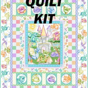 May include: A colorful quilt kit featuring a whimsical dragon theme. The quilt design includes a central panel with a castle scene and various dragon illustrations. The words "QUILT KIT" are prominently displayed in large, black letters.