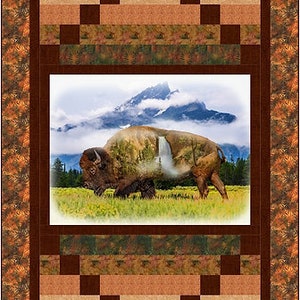 May include: A quilt featuring a brown, green, and beige patchwork design with a central image of a brown bison standing in a field with a mountain range in the background.