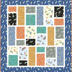 May include: A patchwork quilt with a variety of space and robot themed patterns. The quilt is made up of squares and rectangles of different colors and patterns, including blue, orange, yellow, green, and gray. The patterns include rockets, robots, stars, and planets.