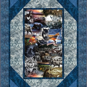 May include: A blue and white quilt with a collage of animals and nature scenes in the center. The collage includes a wolf, a horse, a moose, a bird, and a sunset.