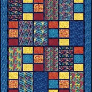 May include: A colorful quilt with a stained glass window design. The quilt is made up of squares of different colors and patterns, including blue, red, yellow, and green. The quilt is framed by a blue border.