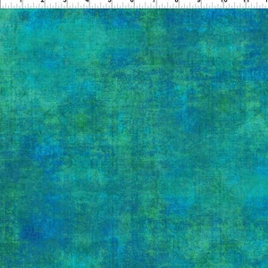 May include: A textured fabric with a blue and green color scheme. The fabric has a mottled appearance, with shades of teal, turquoise, and forest green.