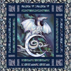 May include: A quilt featuring a white dragon perched on a crescent moon against a starry background. The dragon has large, detailed wings and is surrounded by a dark blue border with a repeating dragon pattern. The quilt's design evokes fantasy and celestial themes.