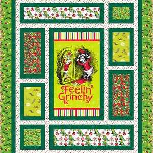 May include: A green and white patchwork quilt with a central panel featuring a cartoon Grinch character looking in a mirror. The panel has the text "Feelin' Grinchy".