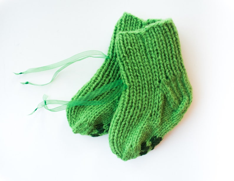 Extra warm baby socks for pet lovers with a paw pattern Excellent holiday knit for your sweetheart. Made of 100/% natural sheep wool
